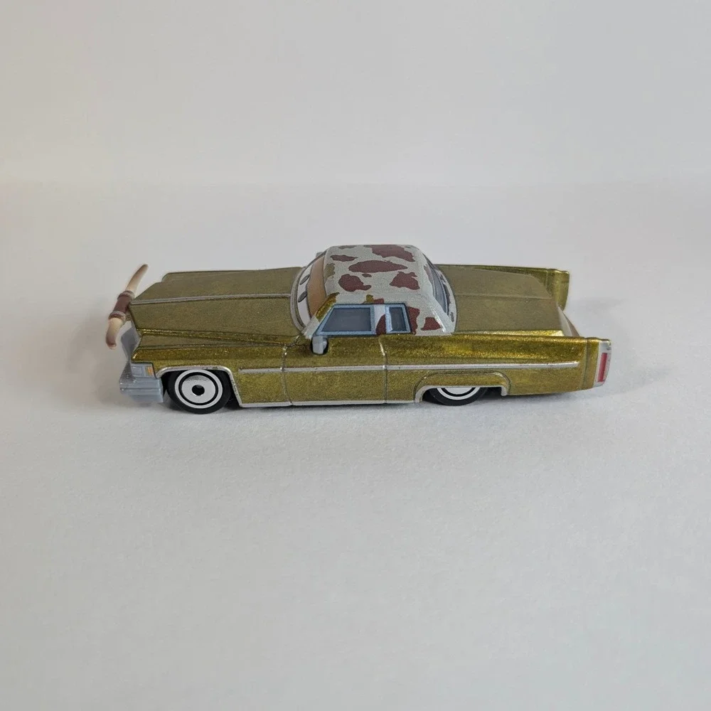 Disney Pixar Cars Tex Dinoco Gold Cadillac Diecast Toy Car Longhorns Mattel